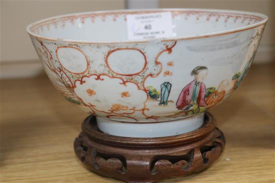 An 18th century Chinese famille rose bowl, wood stand